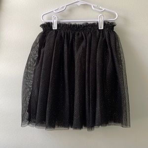 Gorgeous Black shimmering skirt. Sizes 8-10Y. From H&M